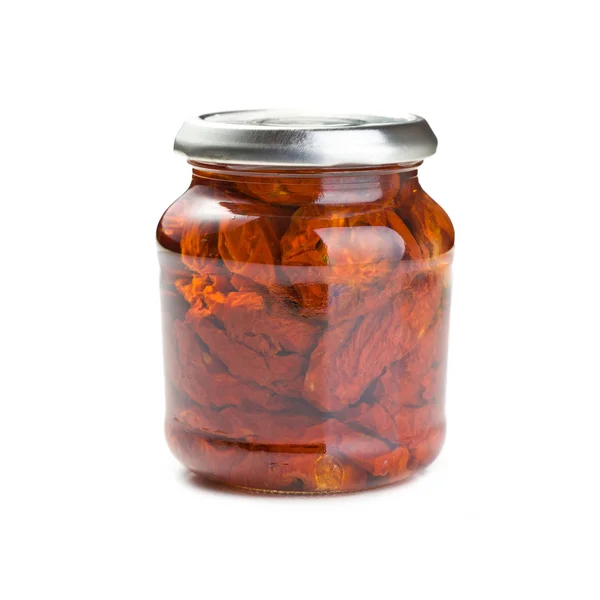 Gedroogde tomaten in glazen pot — Stockfoto