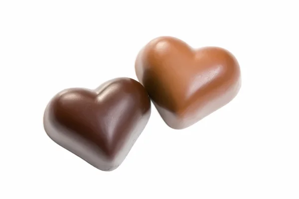 Chocolate hearts on white — Stock Photo, Image