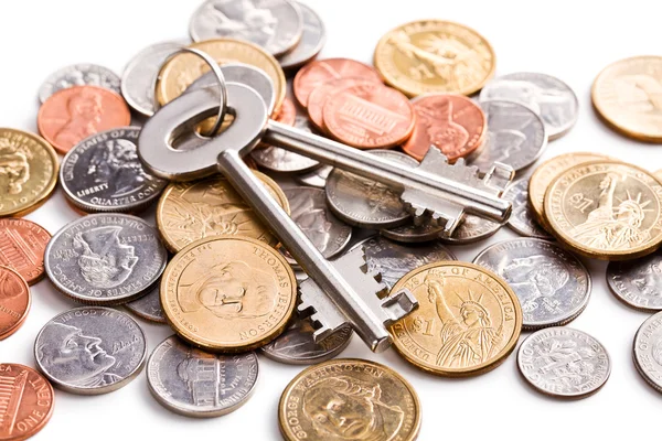 Bezpieczny klucz z monet — Zdjęcie stockowe