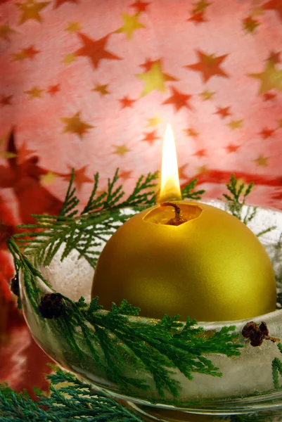 Christmas candle in ice bowl — Stock Photo, Image