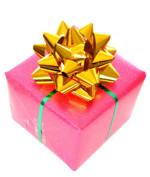 Christmas pink gift box with golden ribbon — Stock Photo, Image