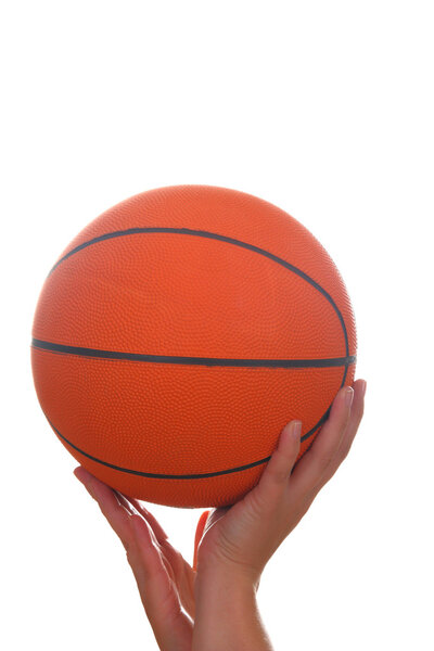 Hand and basketball ball
