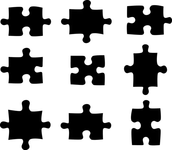 Blank and black puzzle pieces — Stock Photo, Image
