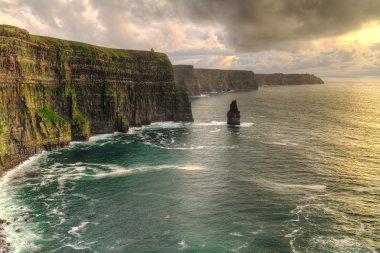 Cliffs of Moher at sunset clipart