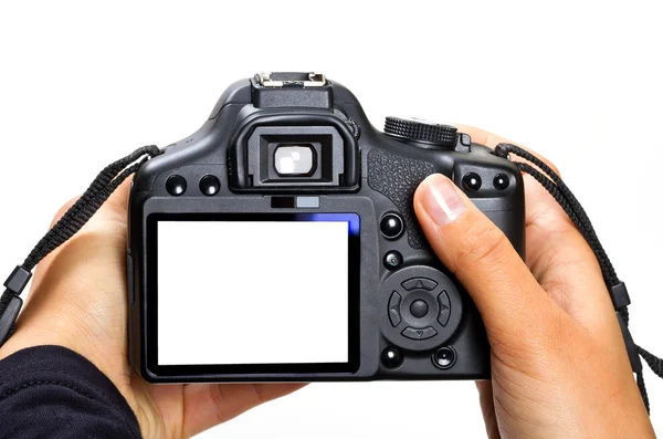 Câmera DSLR em mãos femininas — Fotografia de Stock