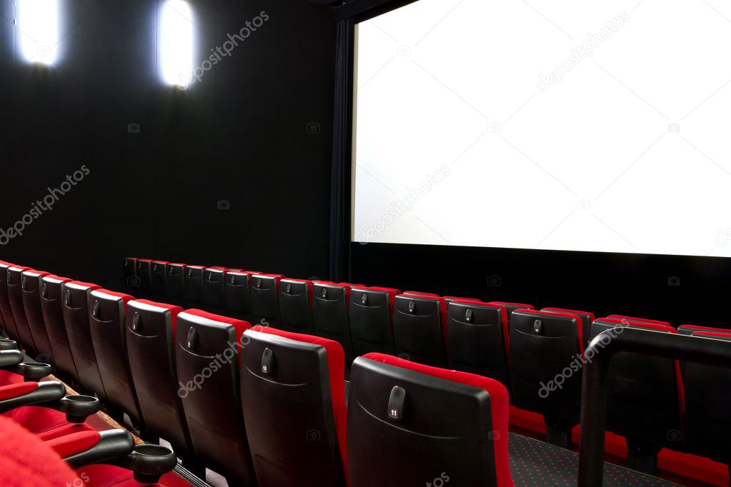 Empty cimema seats and white screen