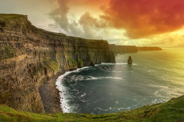 Cliffs of Moher at sunset clipart