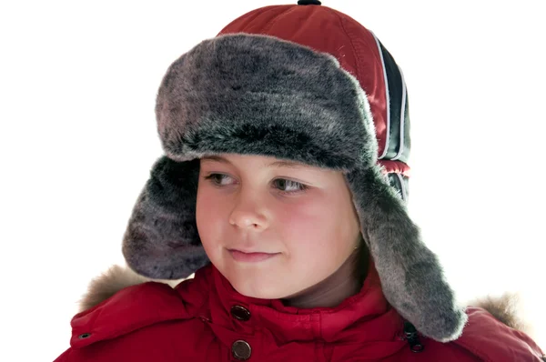 Um menino em roupas de inverno isolado no fundo branco — Fotografia de Stock