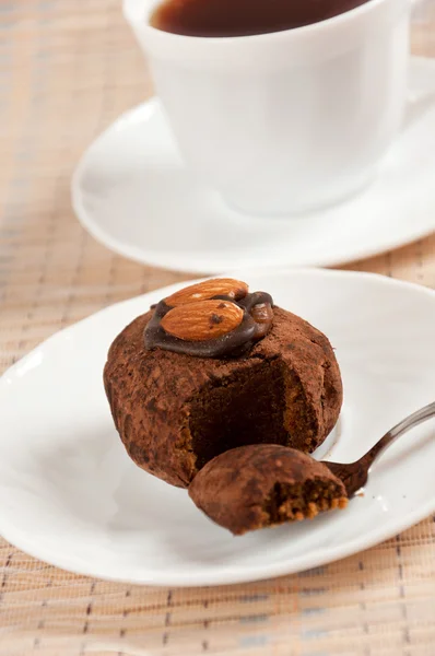 A delicious dessert - almond truffles and coffee — Stock Photo, Image
