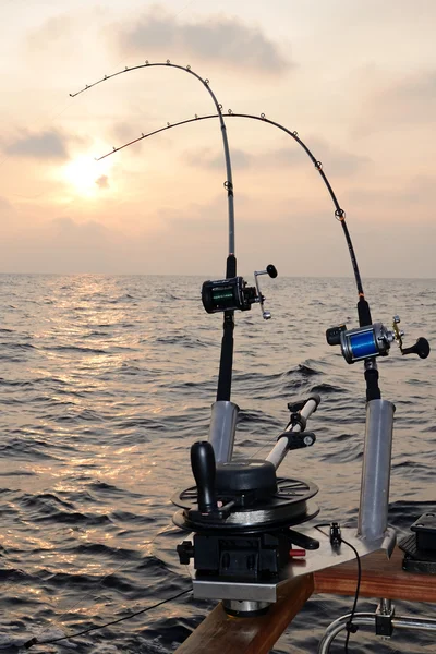Trolling fishing at sunset — Stock Photo, Image