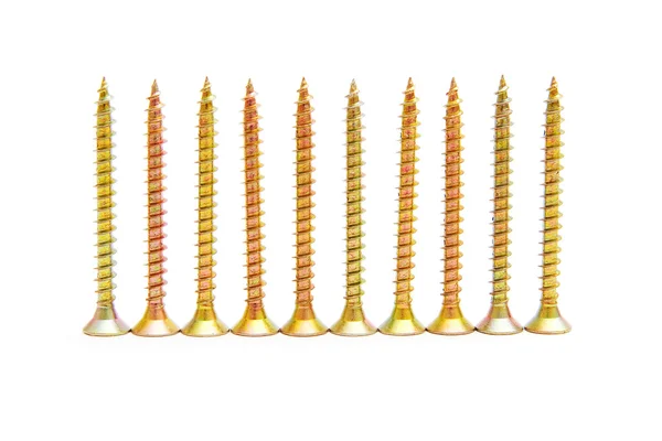 Row of yellow screws — Stock Photo, Image