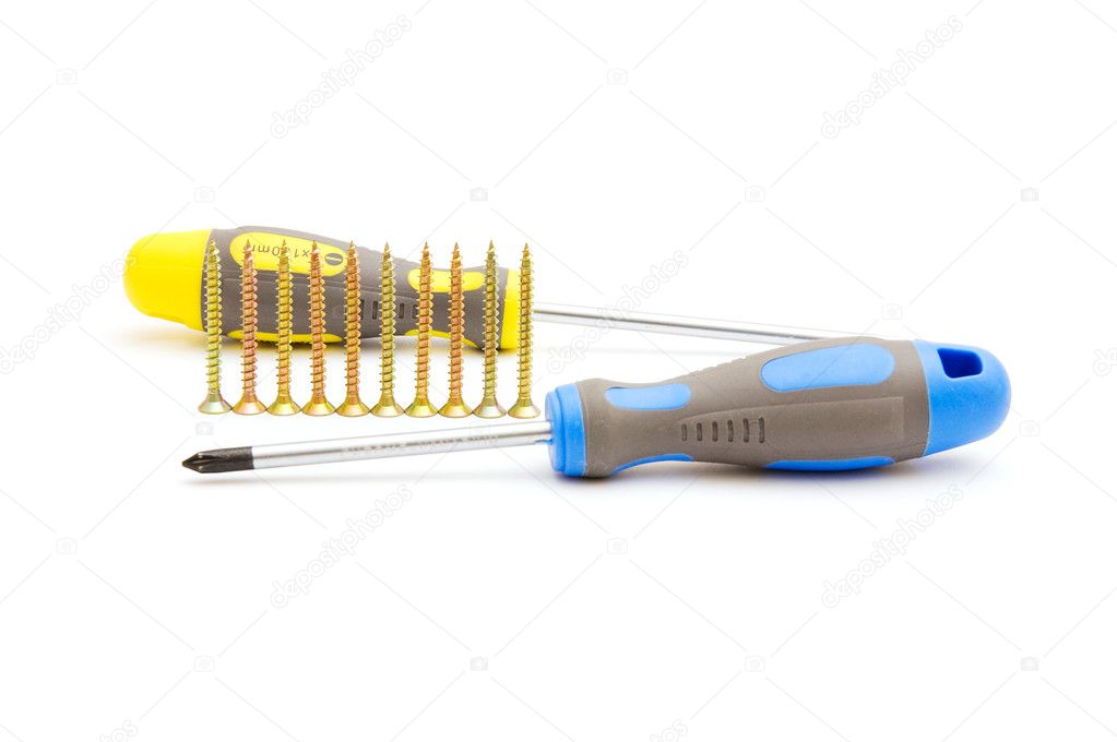 Screwdrivers and row of yellow screws