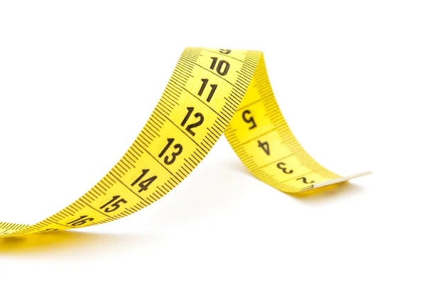 Yellow measuring tape Royalty Free Stock Images