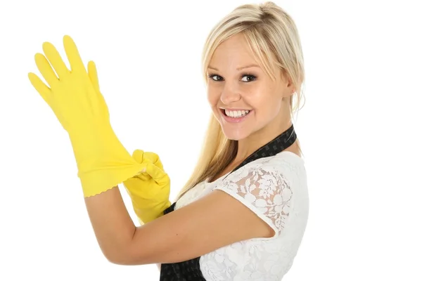 Sevimli gülümseyen kadın sarı eldiven — Stok fotoğraf