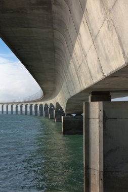 Curved Bridge over the water clipart