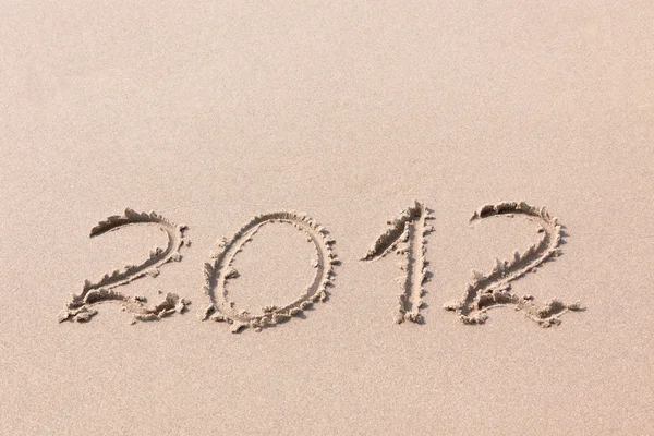 2012 年写在沙滩上 — 图库照片