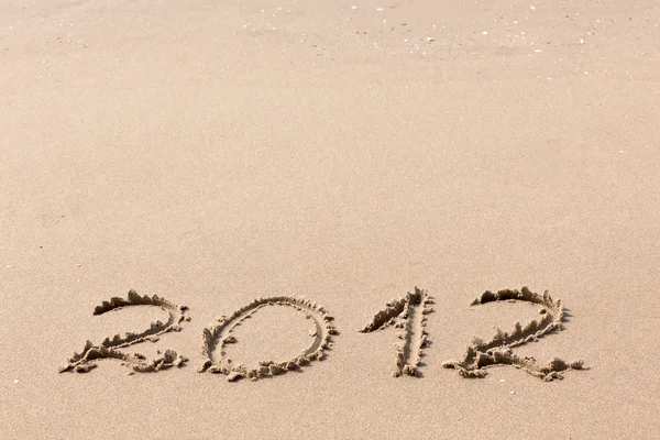 2012 έτος γραμμένο στην άμμο — Φωτογραφία Αρχείου
