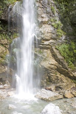 Amazing waterfall Beri in the Alps clipart