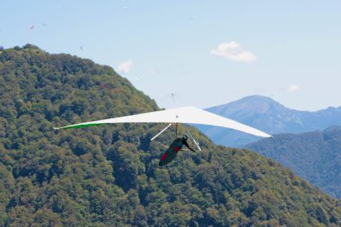 Hang gliding in Slovenia clipart