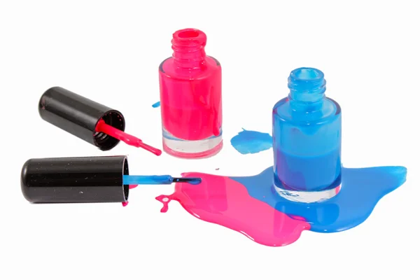 Ovansida av rosa och blå skimrande nagellack — Stockfoto