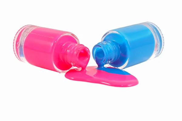 粉色和蓝色波光粼粼指甲油的顶视图 — 图库照片