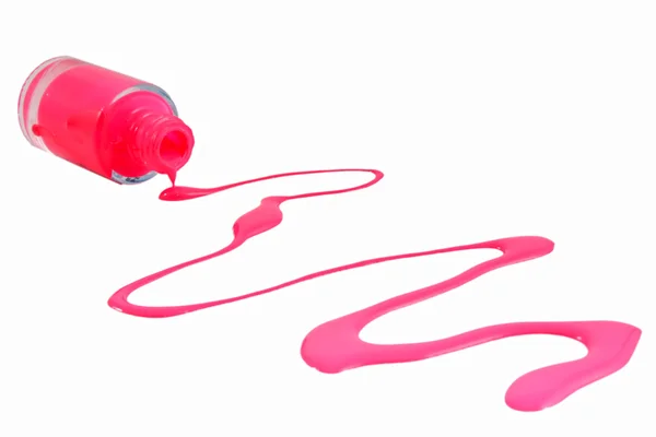 Пляшка рожевого лаку для нігтів і краплі зразків — стокове фото