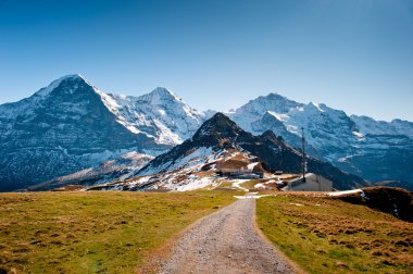 View from Maennlichen with Eiger Moench and Jungfrau clipart