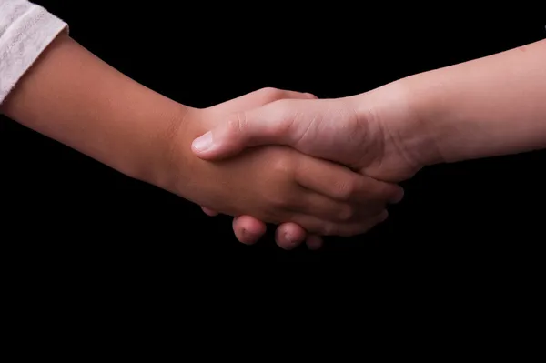 Children shaking hands — Stock Photo, Image