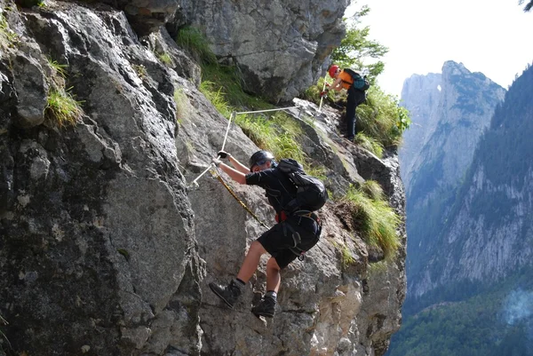 stock image Mountain climbing at Vorderer Gosausee near Dachstein