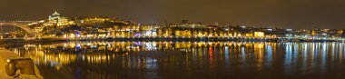 Vila Nova de Gaia at night opposite Porto, Portugal clipart