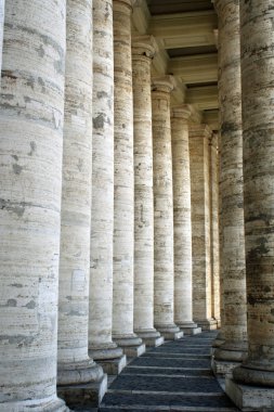 Rows of massive marble pillars clipart