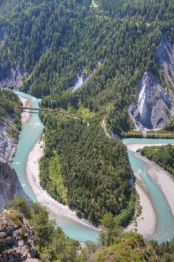 Glacier Express crosses bridge and Rhine bend clipart