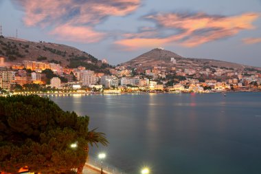 City of Saranda in Albania at sunset clipart