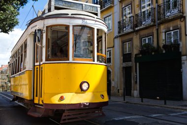 Classic yellow tram of Lisbon, Portugal clipart
