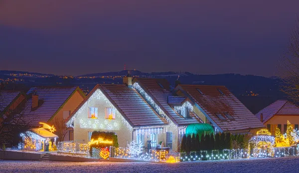 stock image Houses decorated with christmas lights