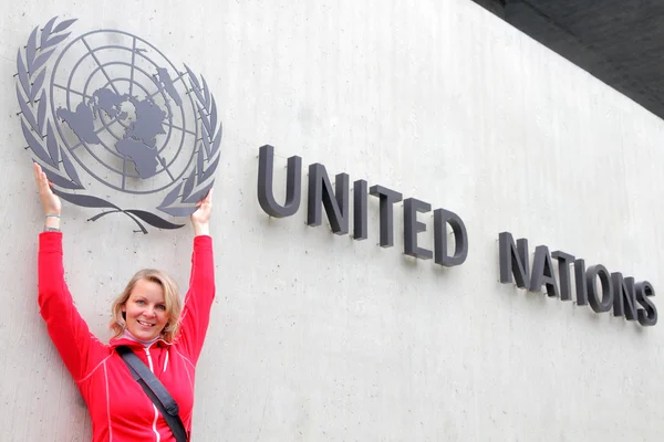 stock image Girl holds the world