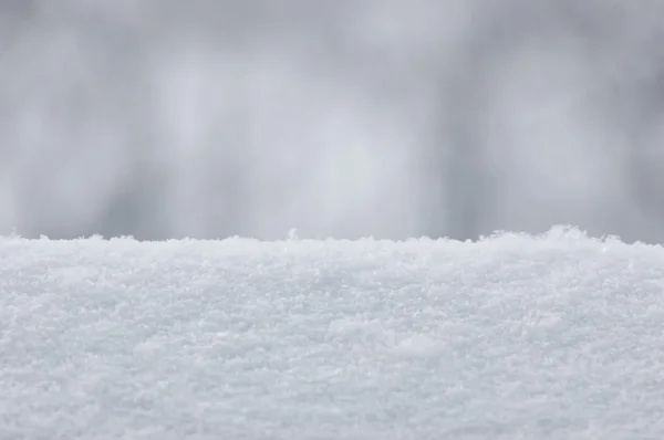 Fundo fresco da textura da neve Closeup, Grande padrão de macro detalhado, Bokeh suave, Horizontal Fotos De Bancos De Imagens Sem Royalties