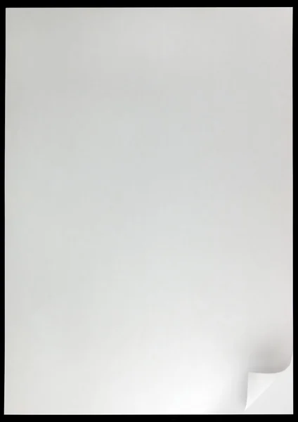 Witte pagina krul achtergrond geïsoleerd op zwart — Stockfoto