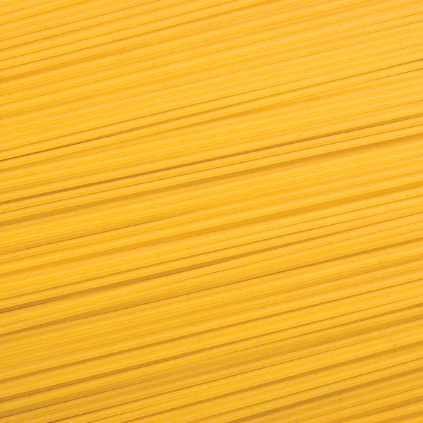 Traditionella spaghetti pasta närbild bakgrund makro — Stockfoto