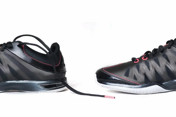 Pár sportovní obuvi na bílém pozadí — Stock fotografie