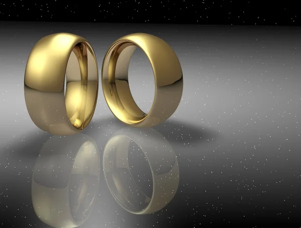Dois anel de casamento em um fundo céu noite — Fotografia de Stock