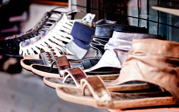 stock image Bazaar bunch of colorful fashion footwear items