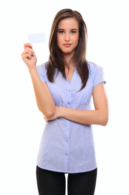 Brunette woman holding a blank businesscard