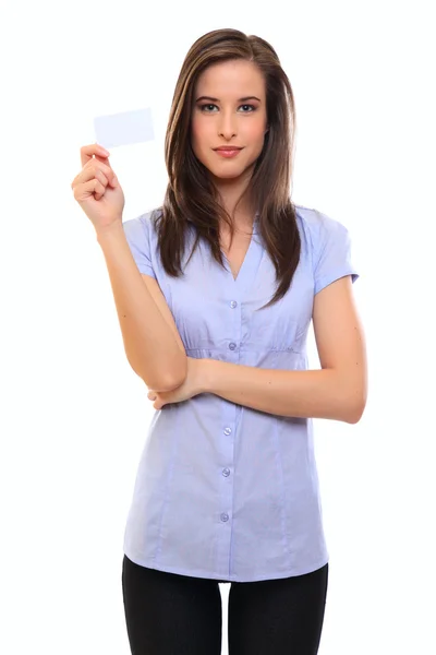 Brunette woman holding a blank businesscard — Stock Photo, Image
