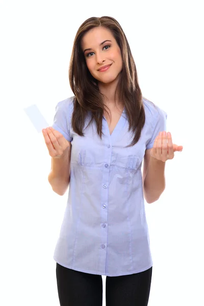 Young happy brunette woman holding a blank businesscard — Stok fotoğraf