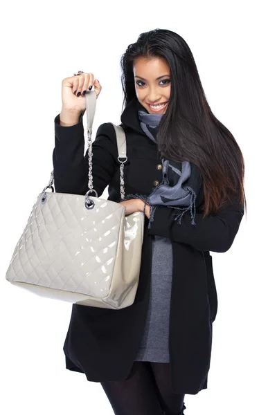 Happy young asian woman looking for something in the bag — Stock Photo, Image