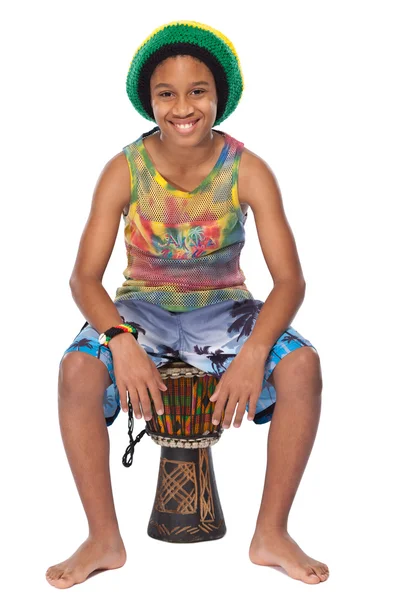 Jonge afroamerican jongen met zijn conga — Stockfoto