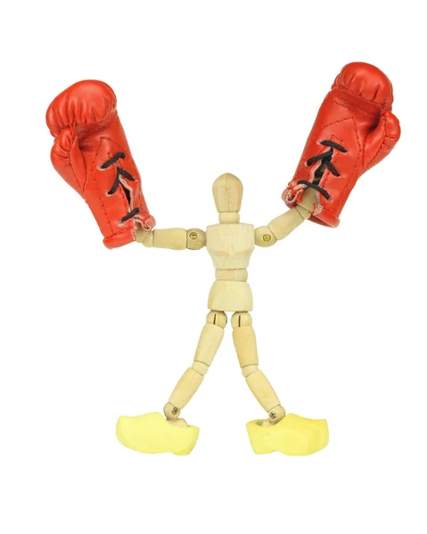 Wooden mannequin with boxing gloves and wooden shoes — Stock Photo, Image