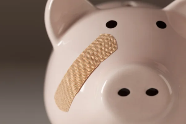 Piggy Bank with Bandage on Face — Stock Photo, Image