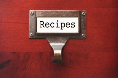 Lustrous Wooden Cabinet with Recipes File Label clipart